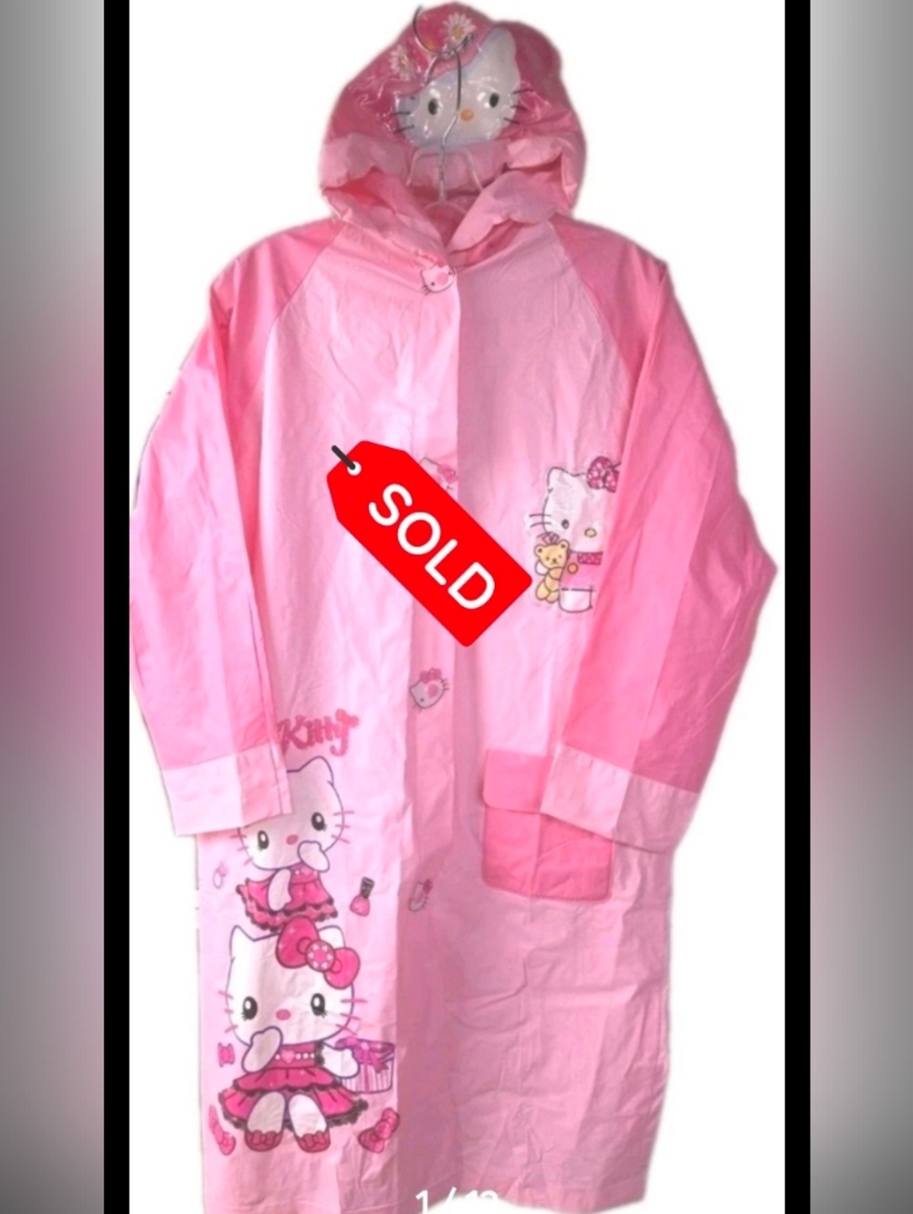 SOLD....Hello Kitty Pink Raincoat Kids XXL with inflatable hood and backpack